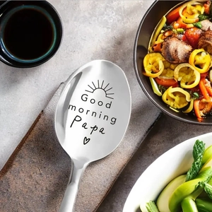 Engraved Good morning Papa stainless steel spoon for Father's Day gift on a dining table