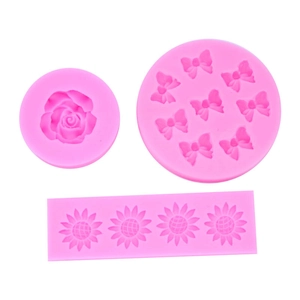 Pink silicone mold set featuring 8-cavity bow, sunflower, and rose shapes for baking