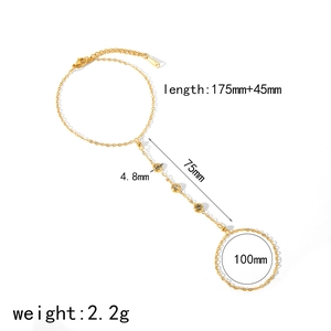 18K gold plated slave bracelet with three clear zircons and wrist-to-finger chain link