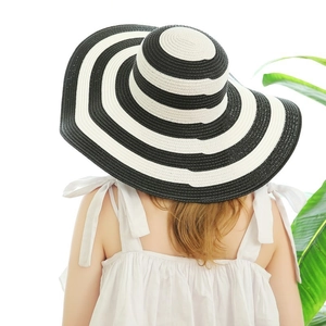 Women's summer wide brim straw hat with classic black and white stripes for sun protection