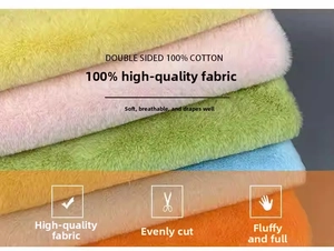 Detail of 100% cotton plush fabric layers in pink, yellow and green showing soft texture