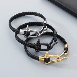 Men's braided leather bracelet set with horseshoe buckle and engraved geometric patterns