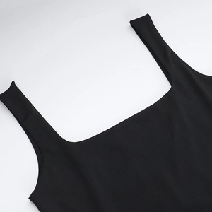 Close-up of black square neck knit vest with wide shoulder straps and elastic fabric detail