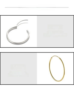 Detail of S925 sterling silver and gold plated hoop earrings with polished finish