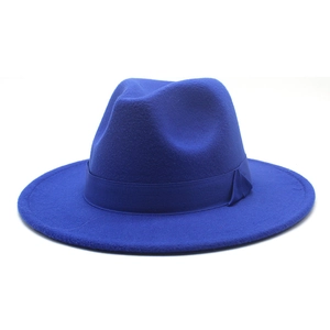 Close-up of a classic dark blue wool fedora hat with a matching grosgrain ribbon detail