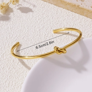 Polished gold knot cuff bracelet with 6.5cm inner diameter minimalist steel jewelry
