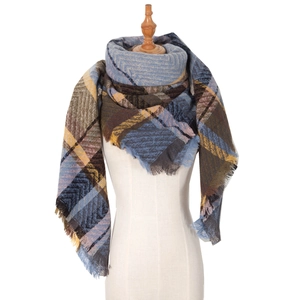 Classic checkered triangle scarf with blue and brown patterns and fringed edges for women
