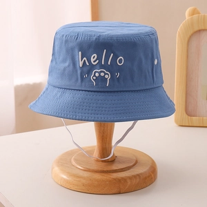 Detail of blue denim bucket hat for kids with hello embroidery and windproof chin strap