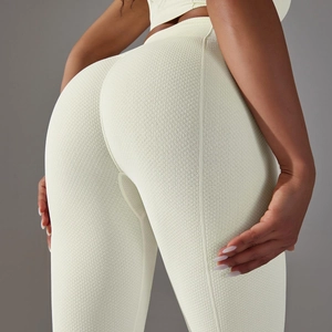 Detail of high waist yoga leggings with honeycomb texture and scrunch butt lifting design