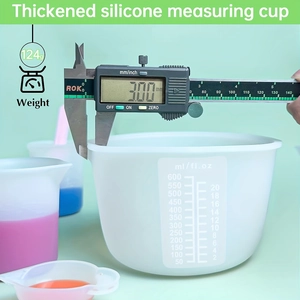 Detailed view of 600ml thick silicone measuring cup showing 3mm wall thickness