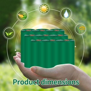 Detailed view of eco-friendly biodegradable green dog poop bags held in hands