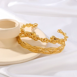 Set bracciali rigidi intrecciati in acciaio inossidabile placcato oro 18k regolabili