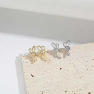 Elegant bow butterfly stud earrings with heart cubic zirconia in gold and silver finish