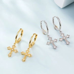 Close-up of S925 sterling silver hoop earrings with micro-set zircon cross pendants