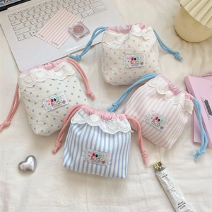 Set of four cute drawstring storage bags with lace trim for cosmetics and travel items