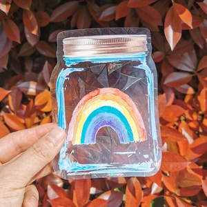 Rainbow prism suncatcher sticker featuring a glass jar design with holographic crackle finish