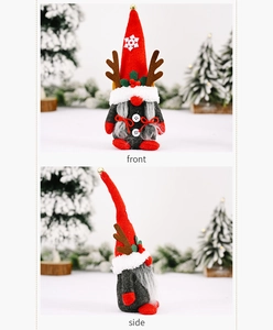 Detailed front and side view of Christmas gnome with reindeer antlers and snowflake embroidery