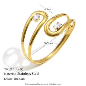 Minimalist 18K gold plated stainless steel open bangle featuring round zircon accents