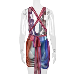 Detail of colorful knit halter dress featuring an open back with lace-up cross tie design