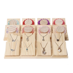 Solid wood jewelry display stand set for necklaces and bracelets on white background