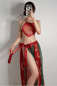 Detailed view of red oriental lingerie with high side slit and traditional patterns