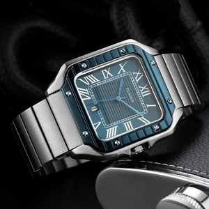 Macro shot of a square quartz watch with a blue dial, Roman numerals, and date window