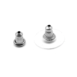 Macro shot of stainless steel earring backs including standard bullet and stabilizing disk styles