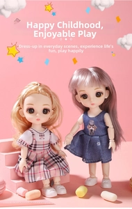 Close-up of two poseable doll figures in plaid and denim dresses with colorful hairstyles