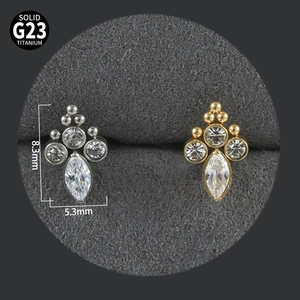 Detailed view of G23 titanium labret studs with zircon insets, size 8.3mm x 5.3mm