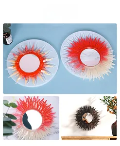 Detail view of sun-shaped silicone mirror molds with gradient and glitter resin finishes