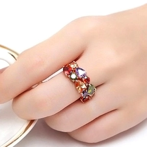 Luxury rainbow gemstone ring with colorful cubic zirconia on a rose gold plated band