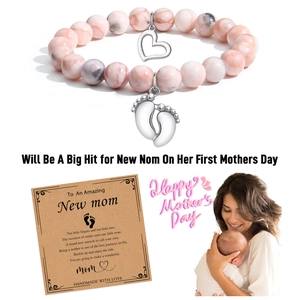 Pink zebra stone beaded bracelet for new moms with baby feet and heart charms