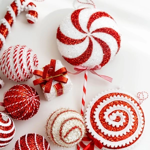 Festive red and white glitter Christmas ornaments set with candies and gift boxes