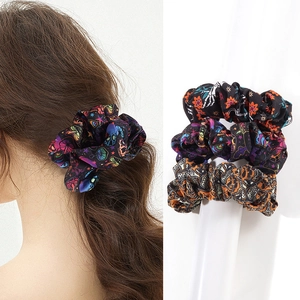 Retro Halloween scrunchies set featuring festive patterns for street party hair styling