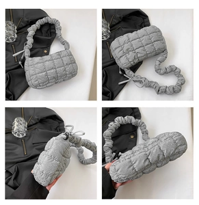 Detailed views of silver quilted crossbody bag with pleated strap from multiple angles