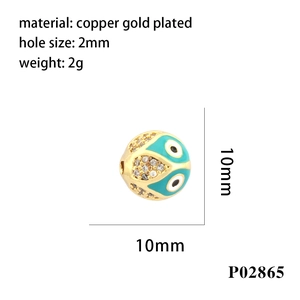 Detail of 10mm gold-plated copper evil eye bead with turquoise enamel and 2mm hole