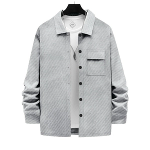 Close-up of grey jacquard knit shirt jacket with flap pocket and black button details