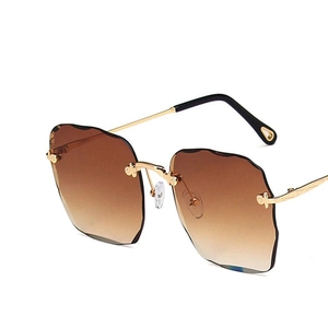 Fashion rimless sunglasses with brown gradient scallop-cut lenses and gold metal frame