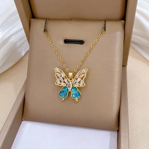 Luxurious titanium steel butterfly necklace with blue opal wings and zircon accents