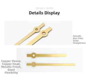 Detail show of golden copper clock hands with smooth edges and polished finish