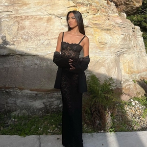 Elegant black lace off-shoulder maxi dress paired with a matching suit jacket for women