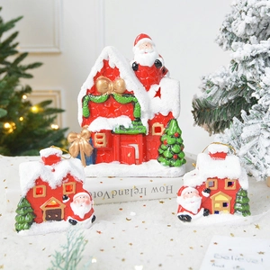 Ceramic Christmas house set with LED lights and snow flocking for festive tabletop decor