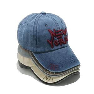 Distressed cotton baseball cap with New York embroidery in blue, grey and beige colors