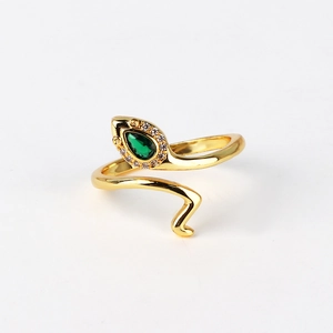 Detail of gold snake open ring with green water-drop stone and zircon accents