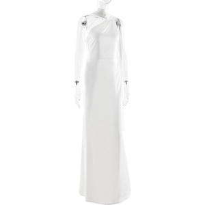 Detail of white one-shoulder maxi dress with elegant cut-out shoulder and slim fit