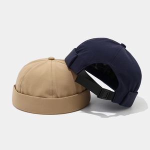Quick-dry docker hats in khaki and navy with adjustable straps and breathable fabric