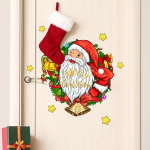 Détail des stickers muraux Père Noël avec inscription Merry Christmas sur une porte en bois