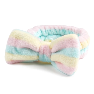 Pluche regenboog gestreepte hoofdband met grote strik voor gezichtsverzorging en make-up