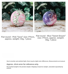 Macro shot of 9x6cm tin candy boxes in pink floral and blue starry sky wedding designs