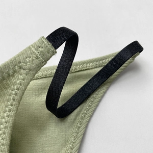 Cotton ribbed thong in grass green with contrasting black elastic waist straps